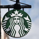 a sign at a starbucks